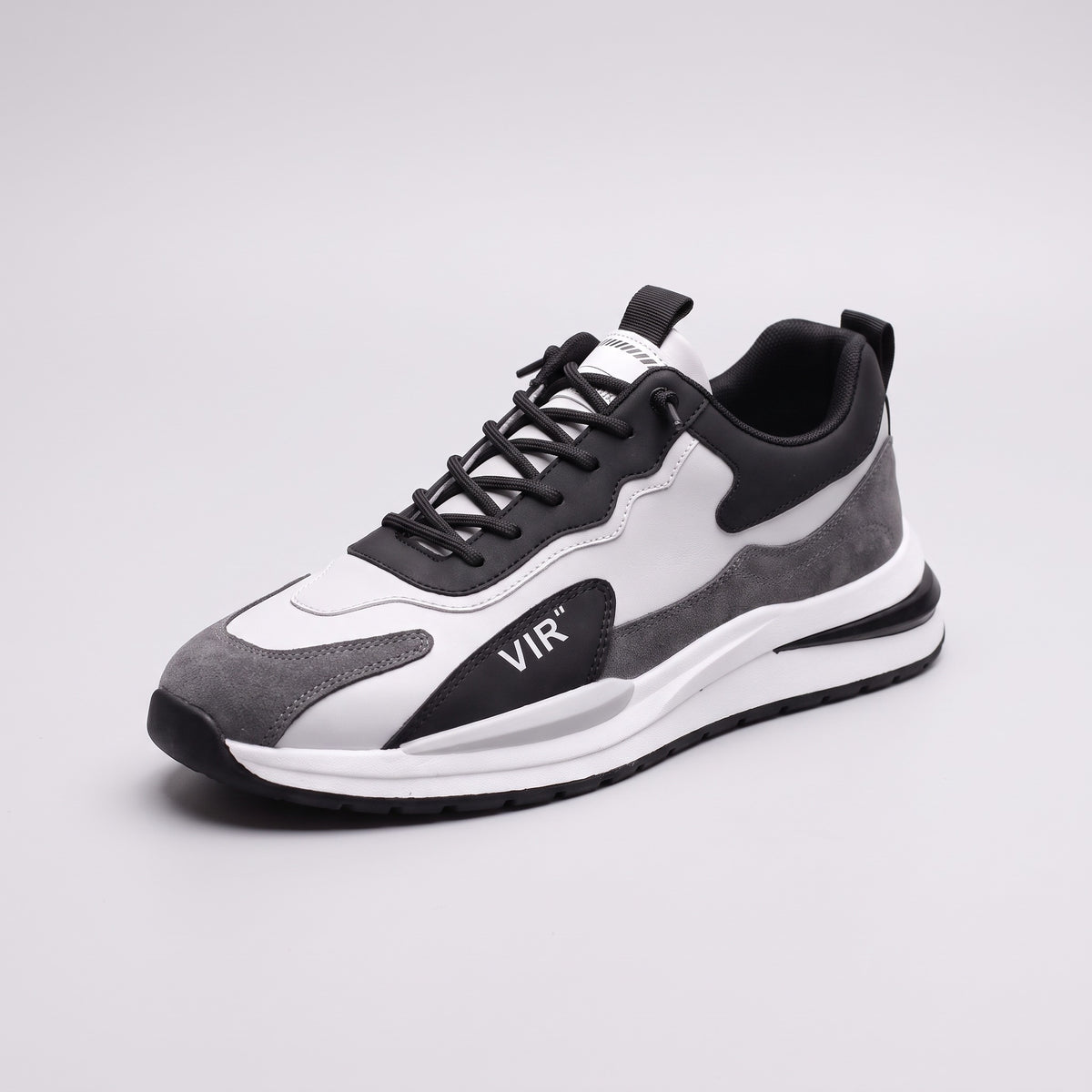 Vintage in Rwanda sneaker in black and grey, three-quarter view