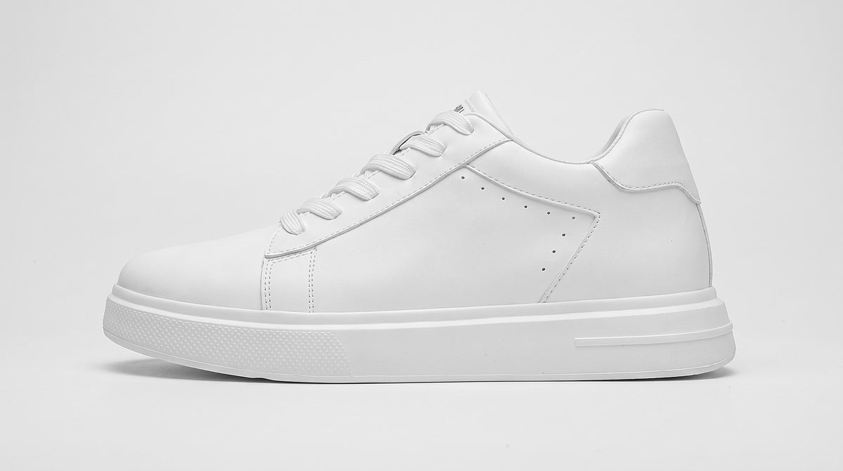 The Apex white leather sneaker, side profile, as it looks from the outside