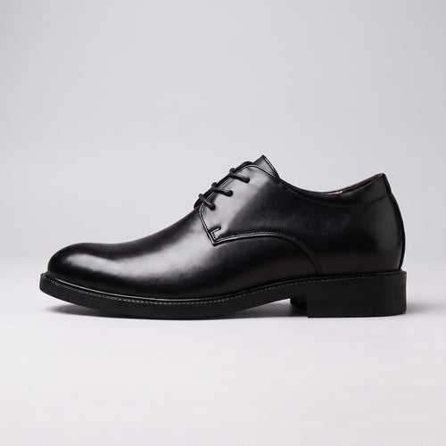 The Summit black leather derby, side profile on a pale grey studio background